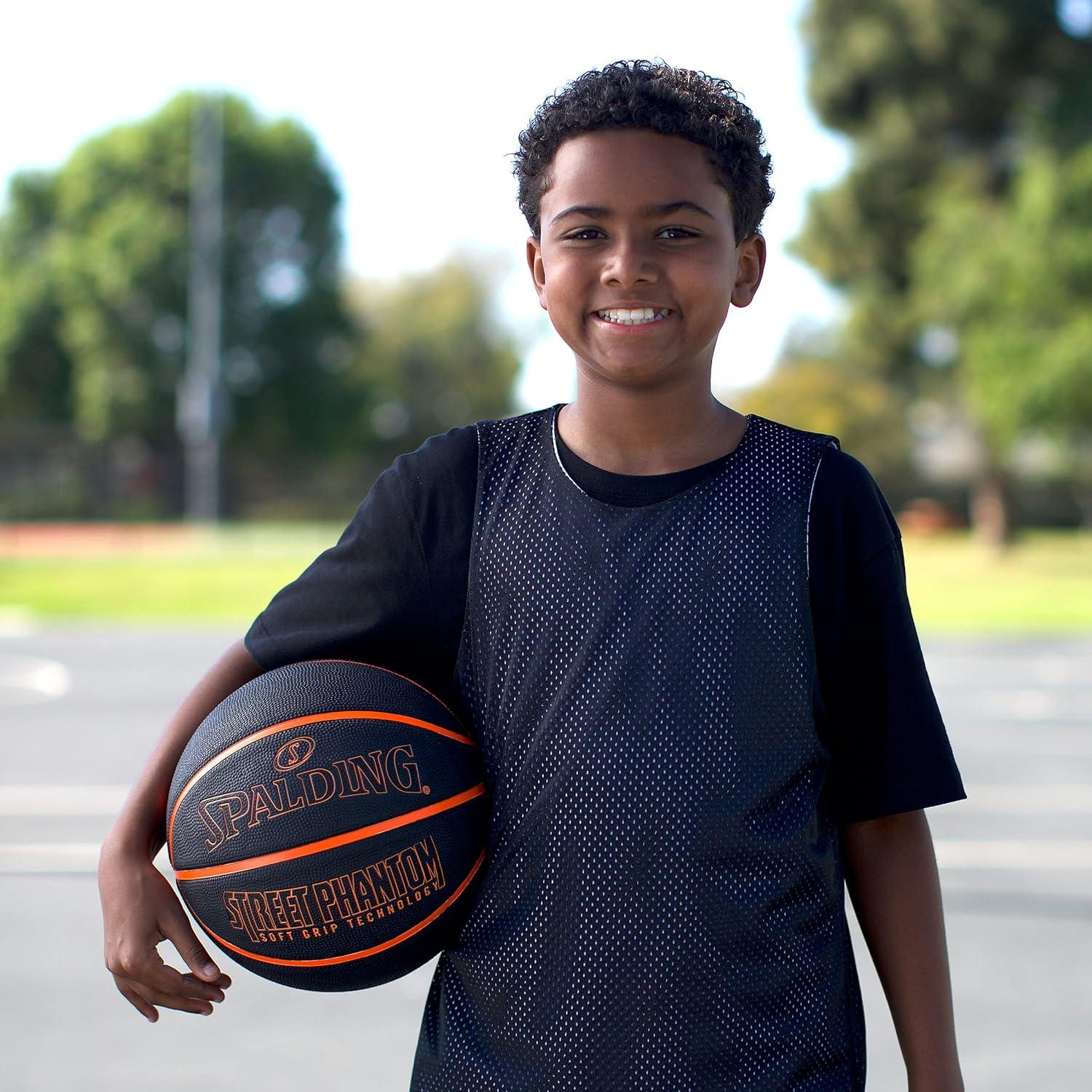 imageSpalding Outdoor Rubber Basketballs  Performance Rubber Cover Designed for Outdoor Play ColorsStreet Phantom  Neon OrangeBlack
